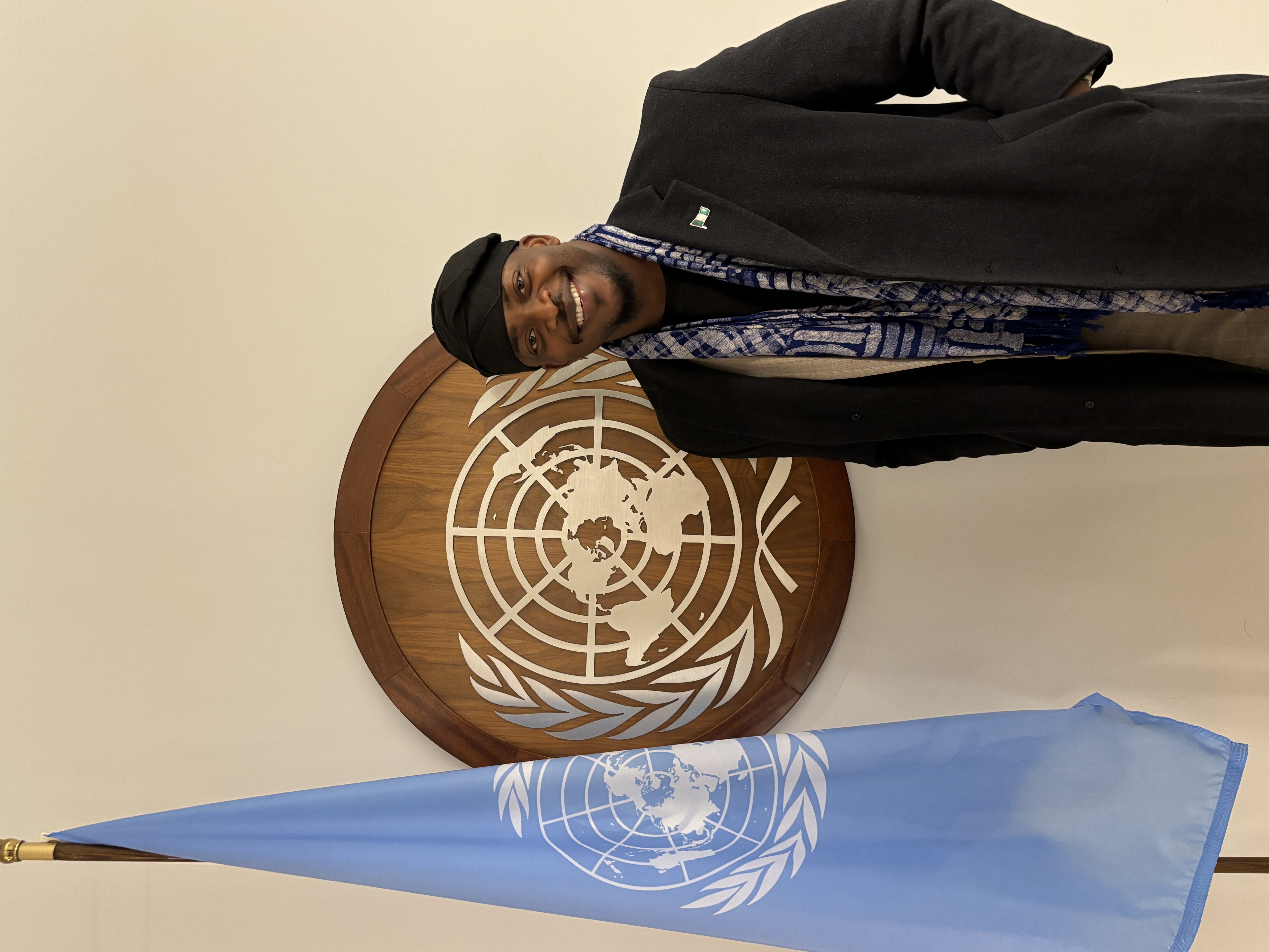 Toluwalase Eniola at the United Nations during an international engagement